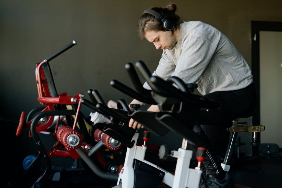 man-in-gray-sweater-exercising