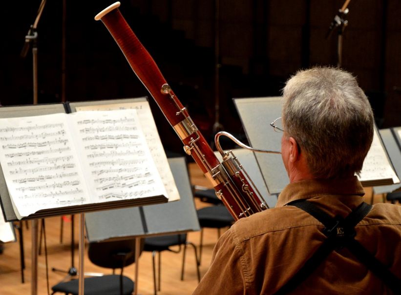 man playing a bassoon