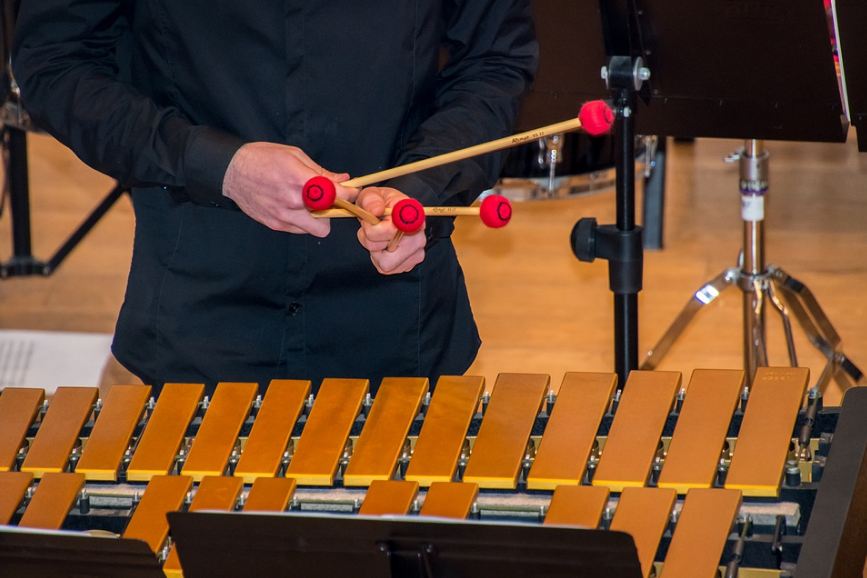 person playing a marimba