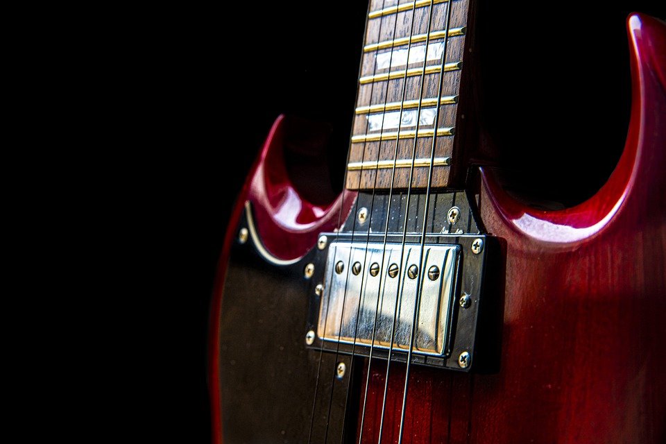 Gibson SG with strings and humbucker