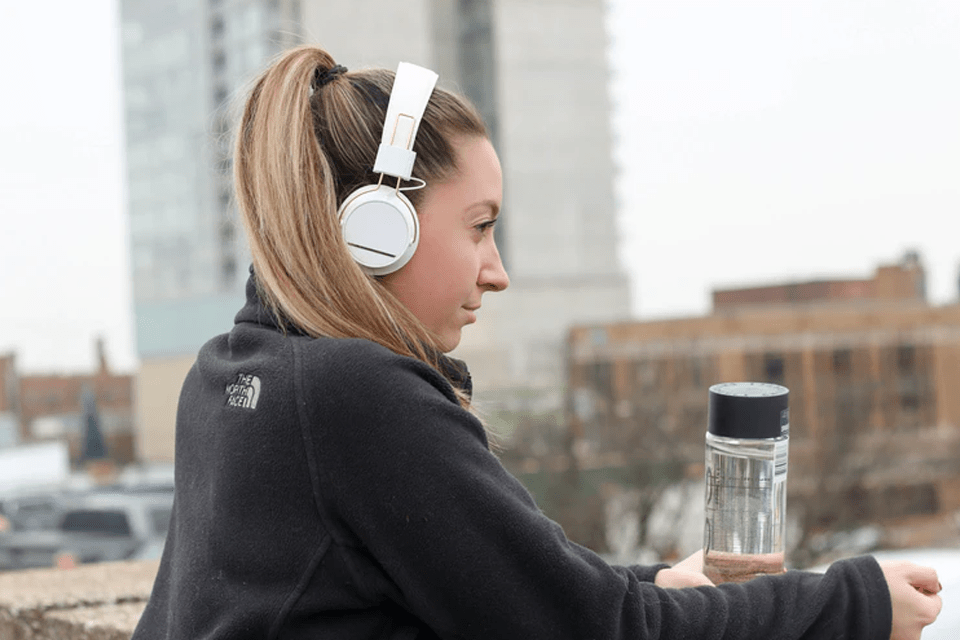 woman listening to music outdoors