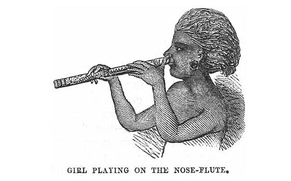 A photo of a Fijian girl playing the nose flute