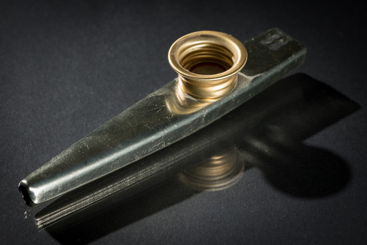 A photo of a metal kazoo