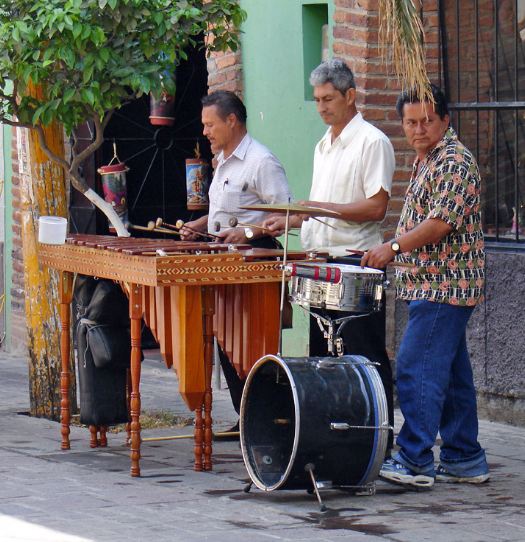 A photo of men playing the marimba